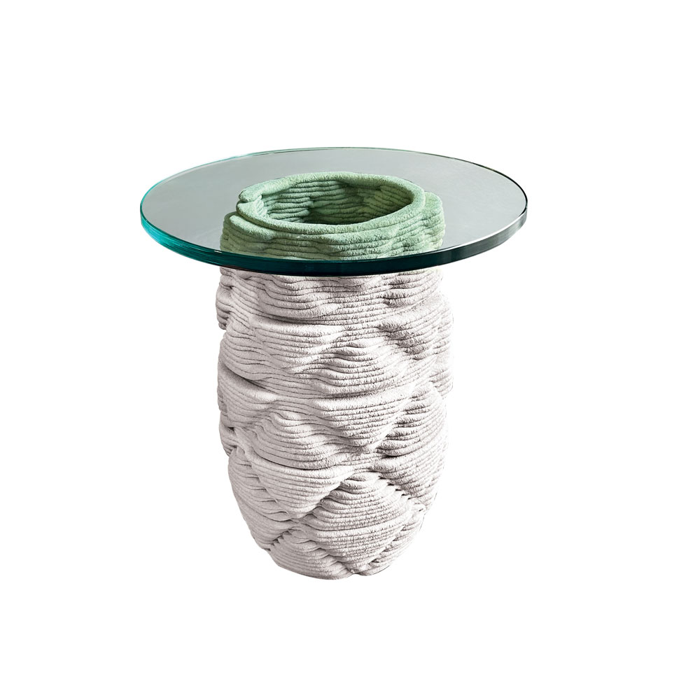 3D concrete printed side table with a tiki pattern and glass top